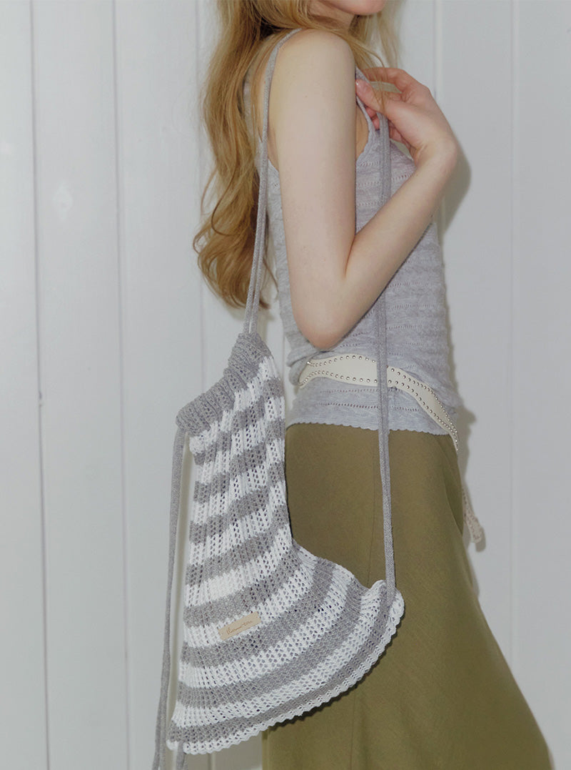 Lurkin stripe knit string backpack