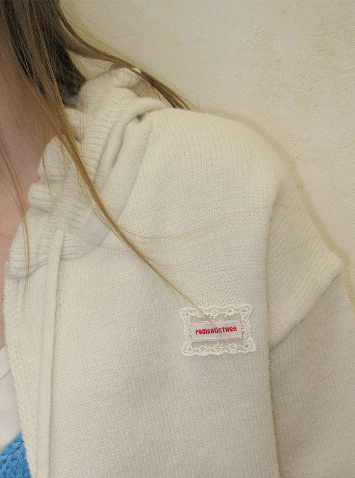 TWEE Berle wave hood long sleeve knit zip-up | Product styling view 8