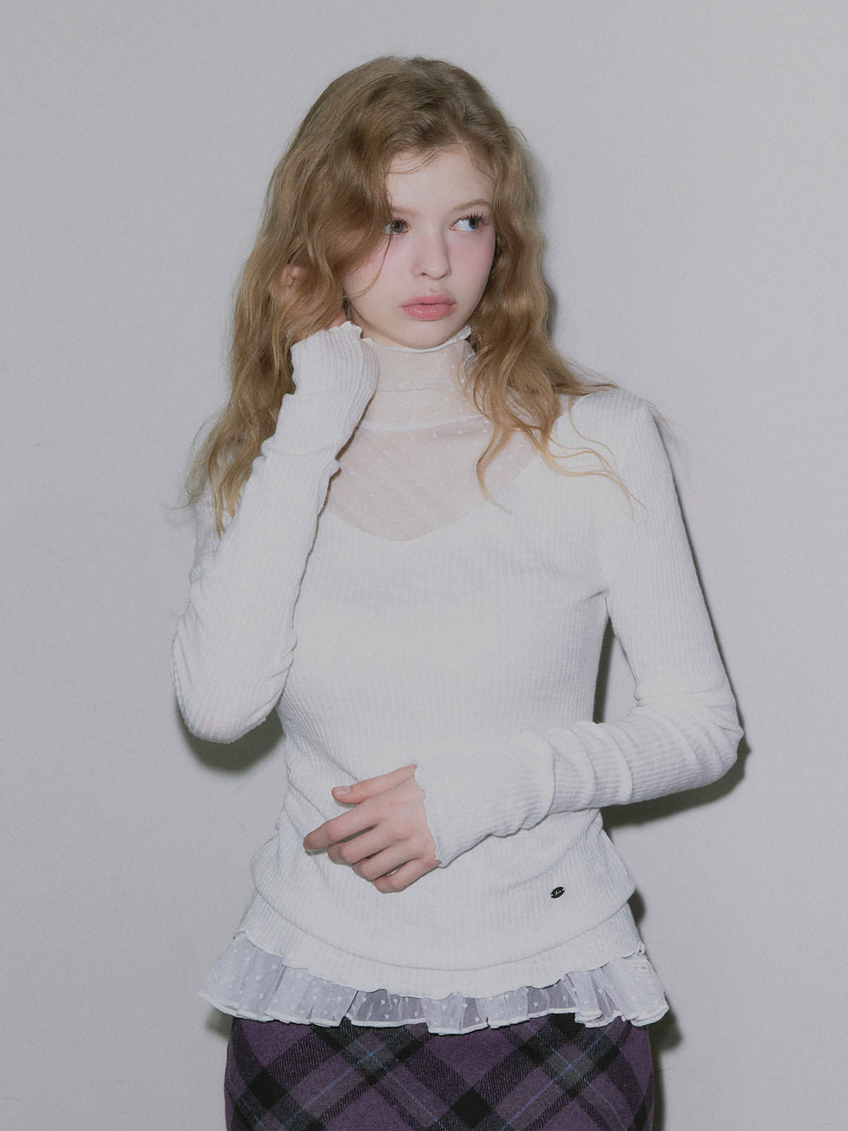 Behi dot see-through turtleneck top