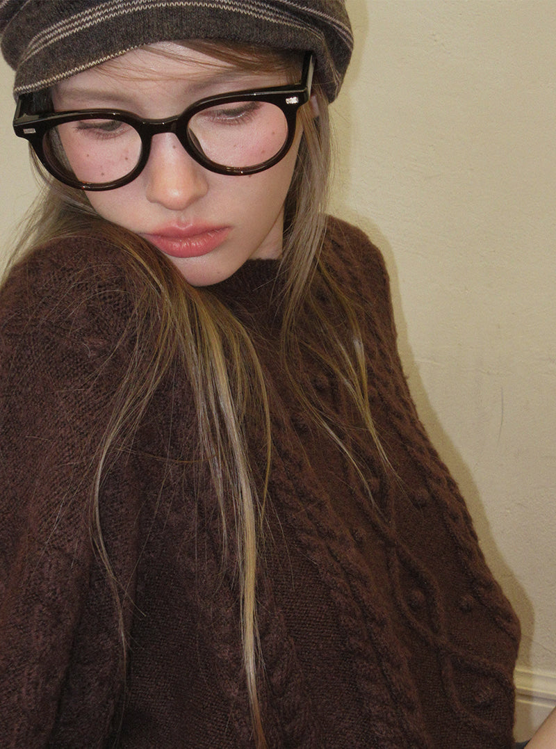 TWEE Kuti cable pattern round neck long sleeve knit | Product styling view 4