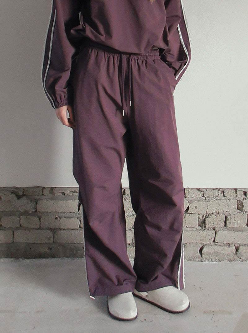 TWEE Mopin lace nylon banding long pants | Product styling view 3