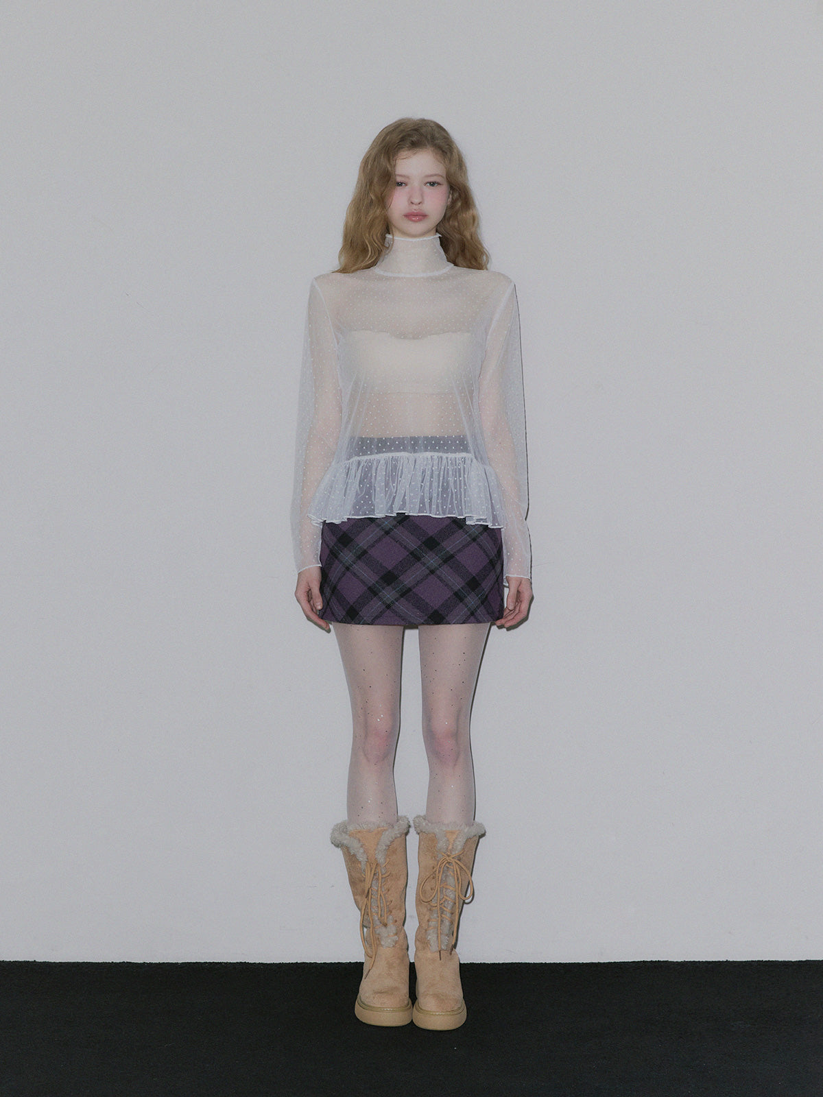Behi dot see-through turtleneck top