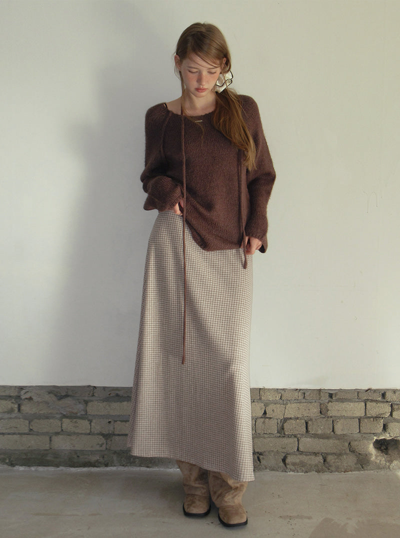 TWEE Pose check banding long skirt | Product styling view 3