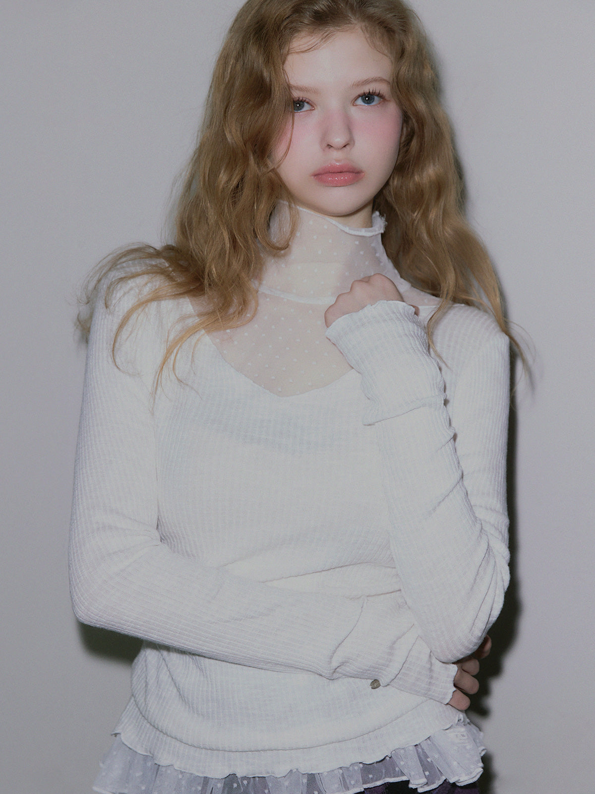 Behi dot see-through turtleneck top