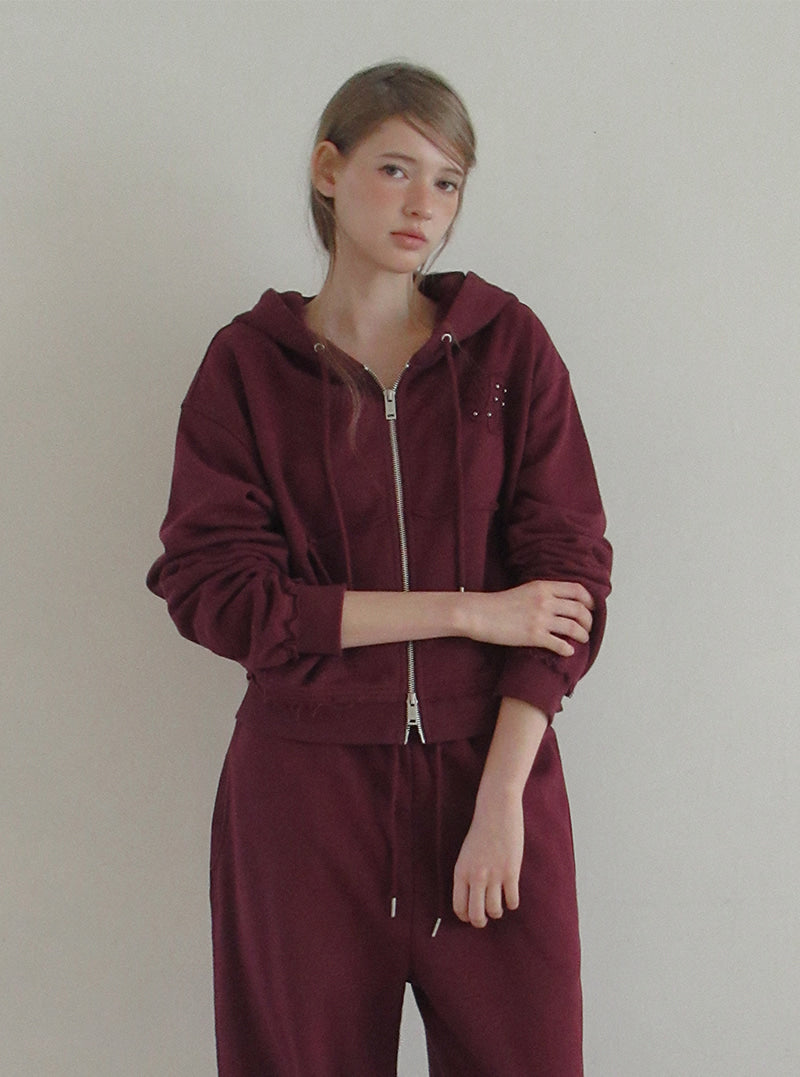 TWEE Revet stud hood zip-up | Product styling view 3