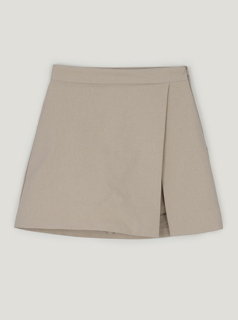 Aren side slit mini skirt | Beige cutout