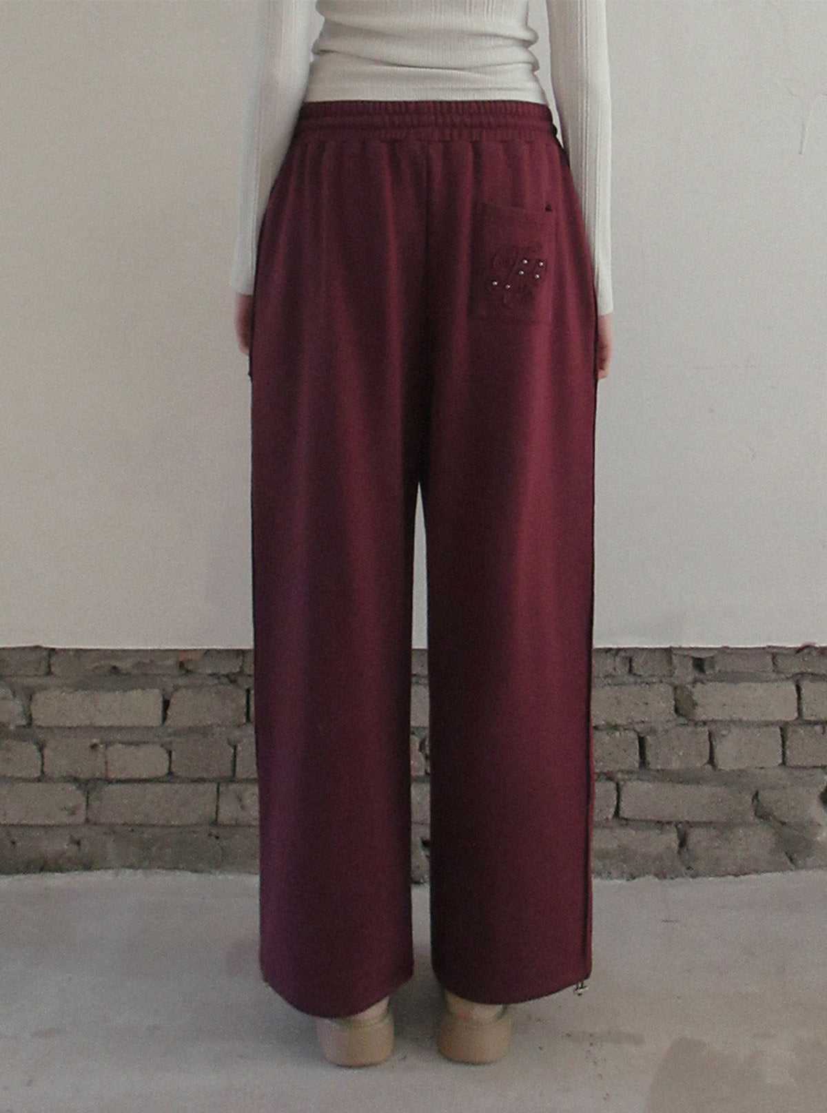 TWEE Reven stud banding long sweatpants | Product styling view 6