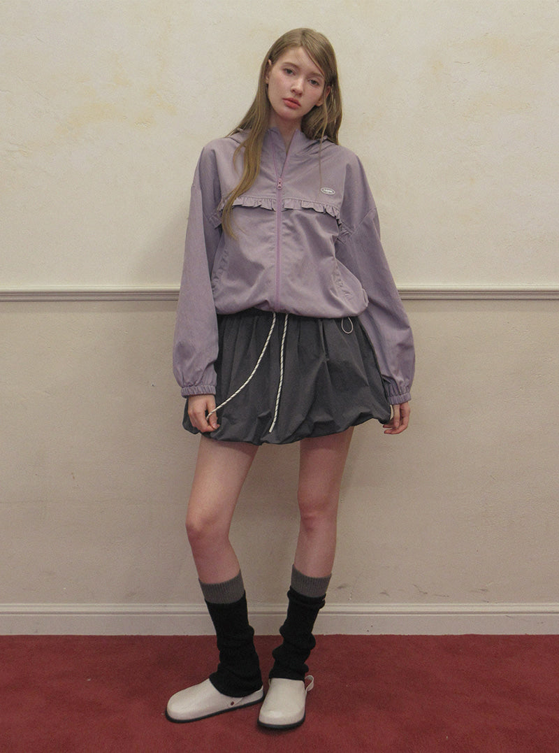 TWEE Colt nylon balloon banding mini skirt | Product styling view 4