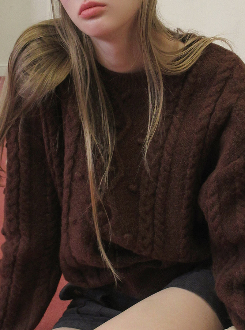 TWEE Kuti cable pattern round neck long sleeve knit | Product styling view 6