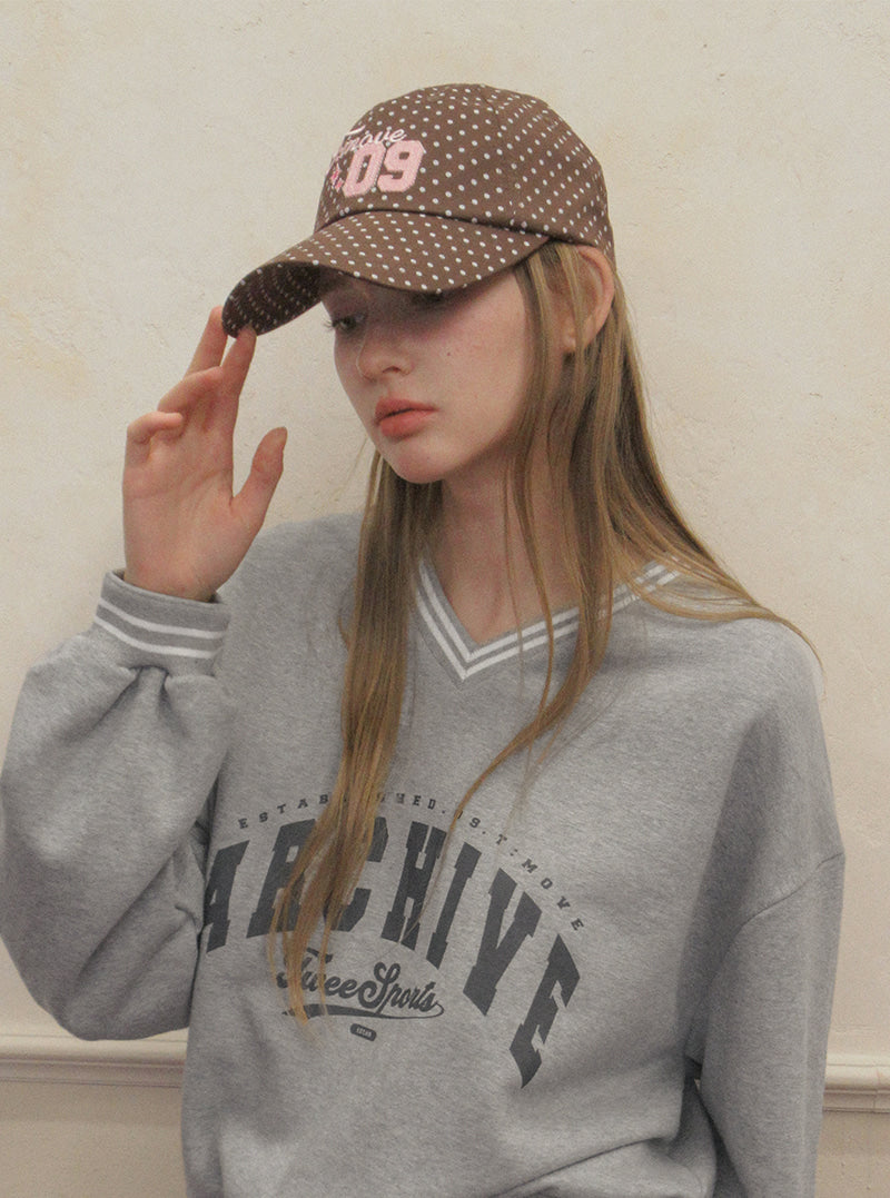 TWEE Teton dot move lettering ball cap | Product styling view 4