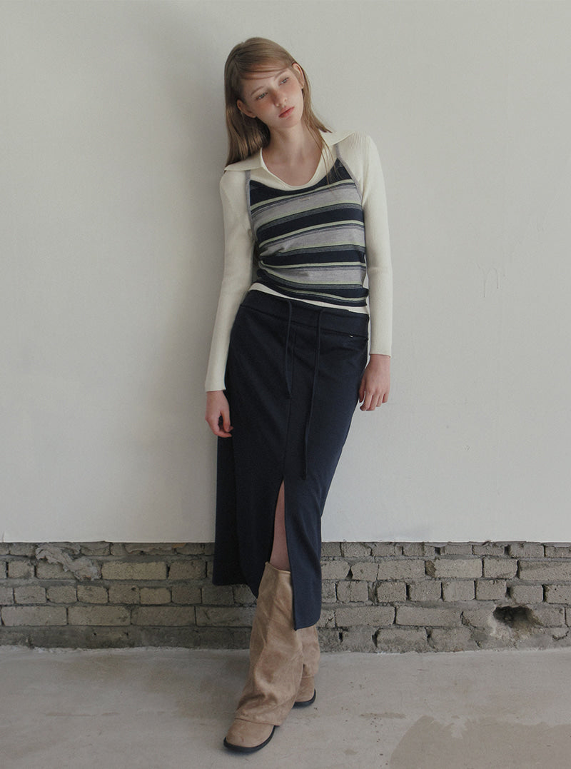 TWEE Tini folding front slit long skirt | Product styling view 6